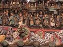 Fine figures cover the rooftops of many a historic temple in Saigons Chinatown.